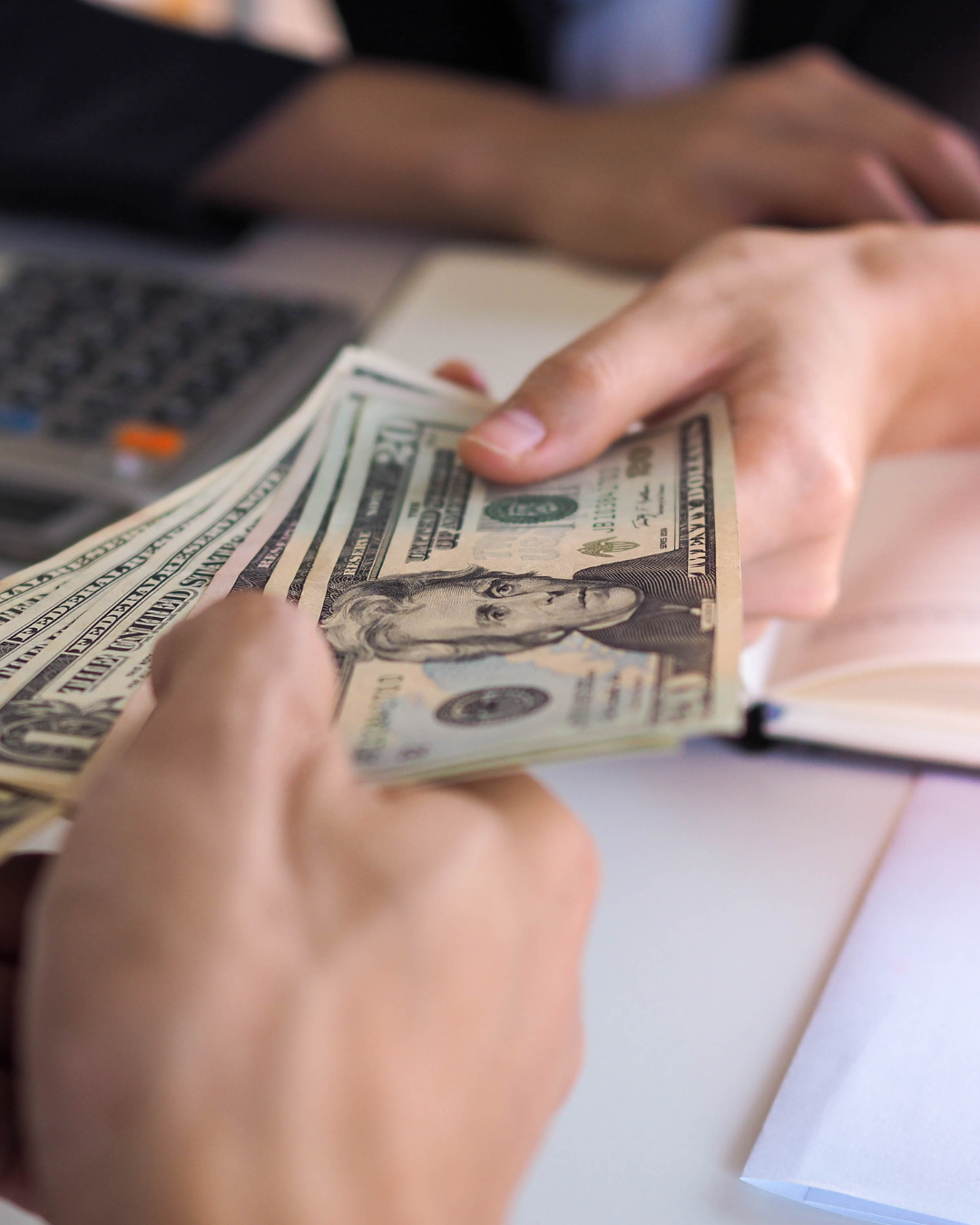 Hand holding money