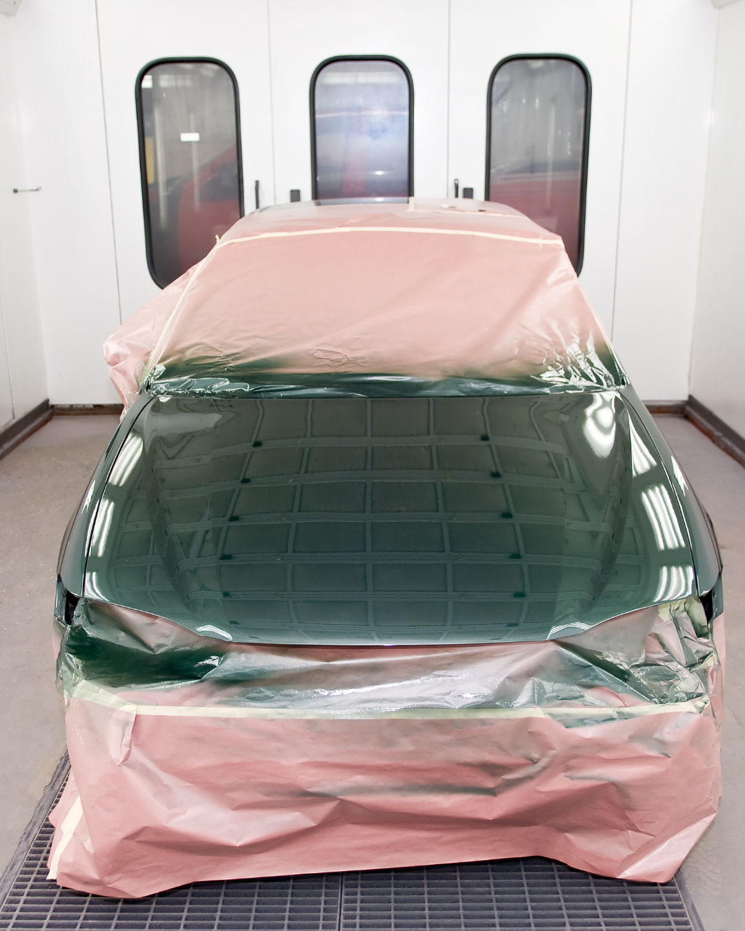 Vehicle inside paint booth